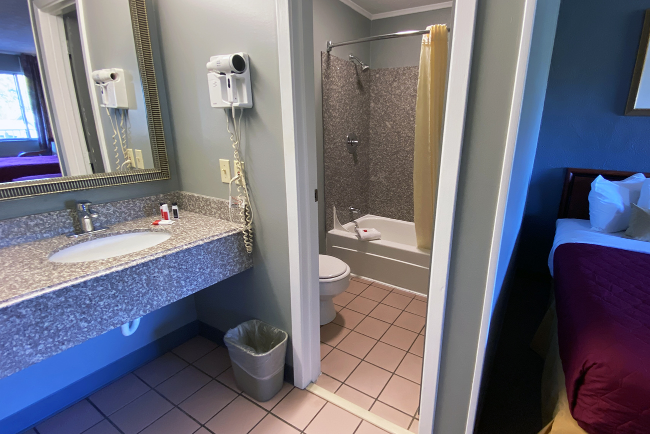 Bathroom gray vanity, bed